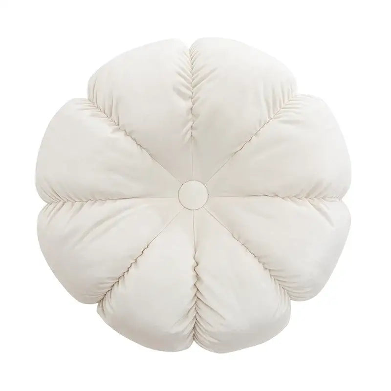 Cream-colored plush flower-shaped cushion with soft fabric and stitched petals for home decor by decorbites 3d flowers pillows