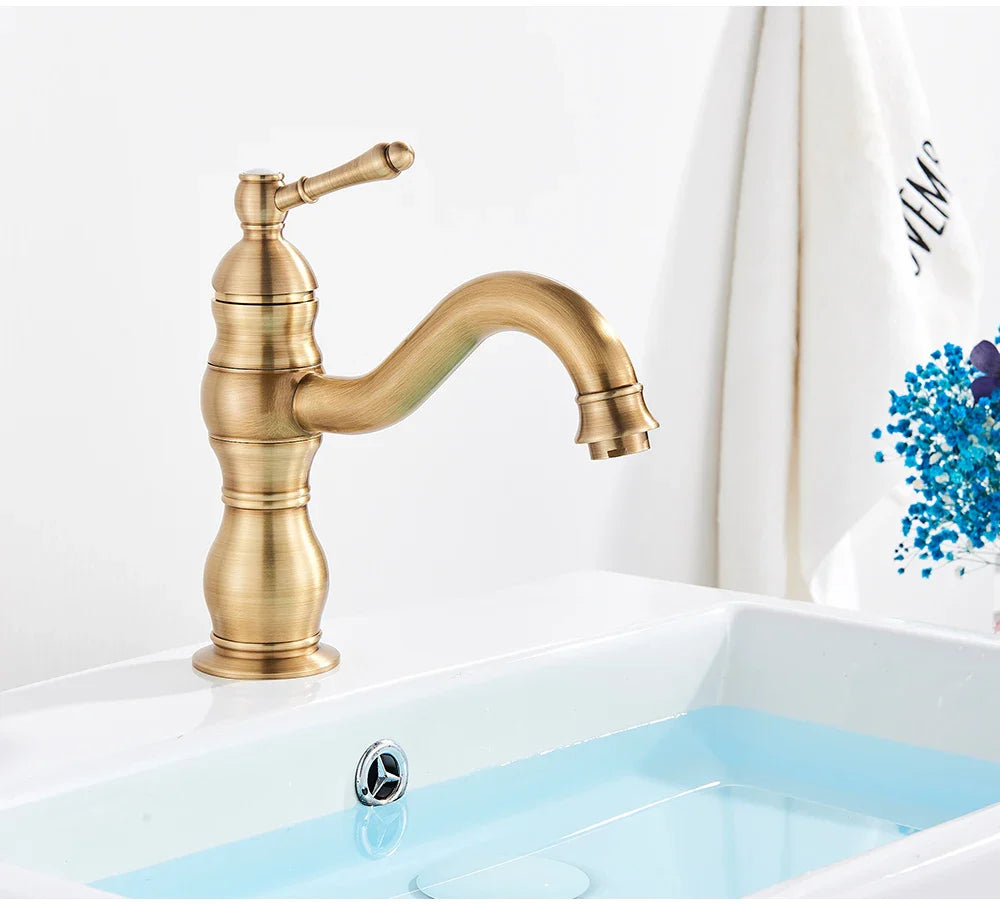 Poiqihy antique brass single hole deck mounted bathroom faucet with ridged brass housing material and curved spout