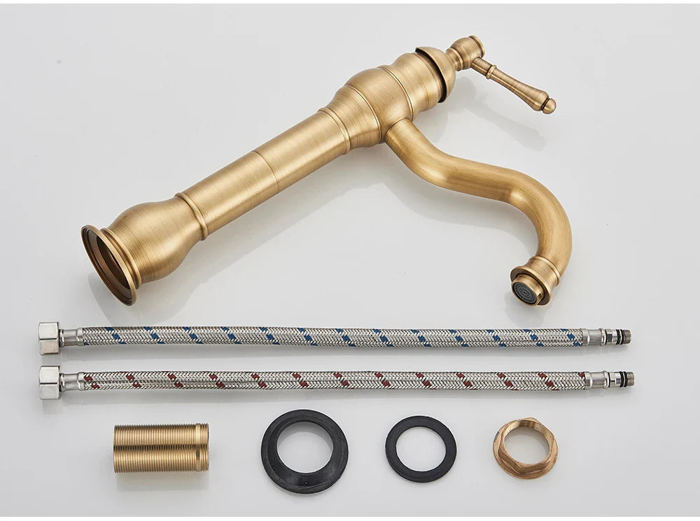 Antique brass deck mounted single hole bathroom faucet with elongated spout and ridged housing material design