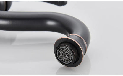 Black matte single hole deck mounted basin vessel sink faucet with copper accent ring and circular spray head housing material