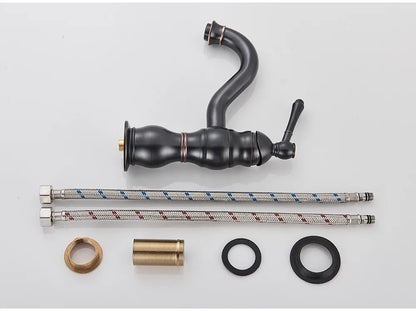 Black matte single hole deck mounted kitchen faucet with curved spout braided metal hoses and durable housing material