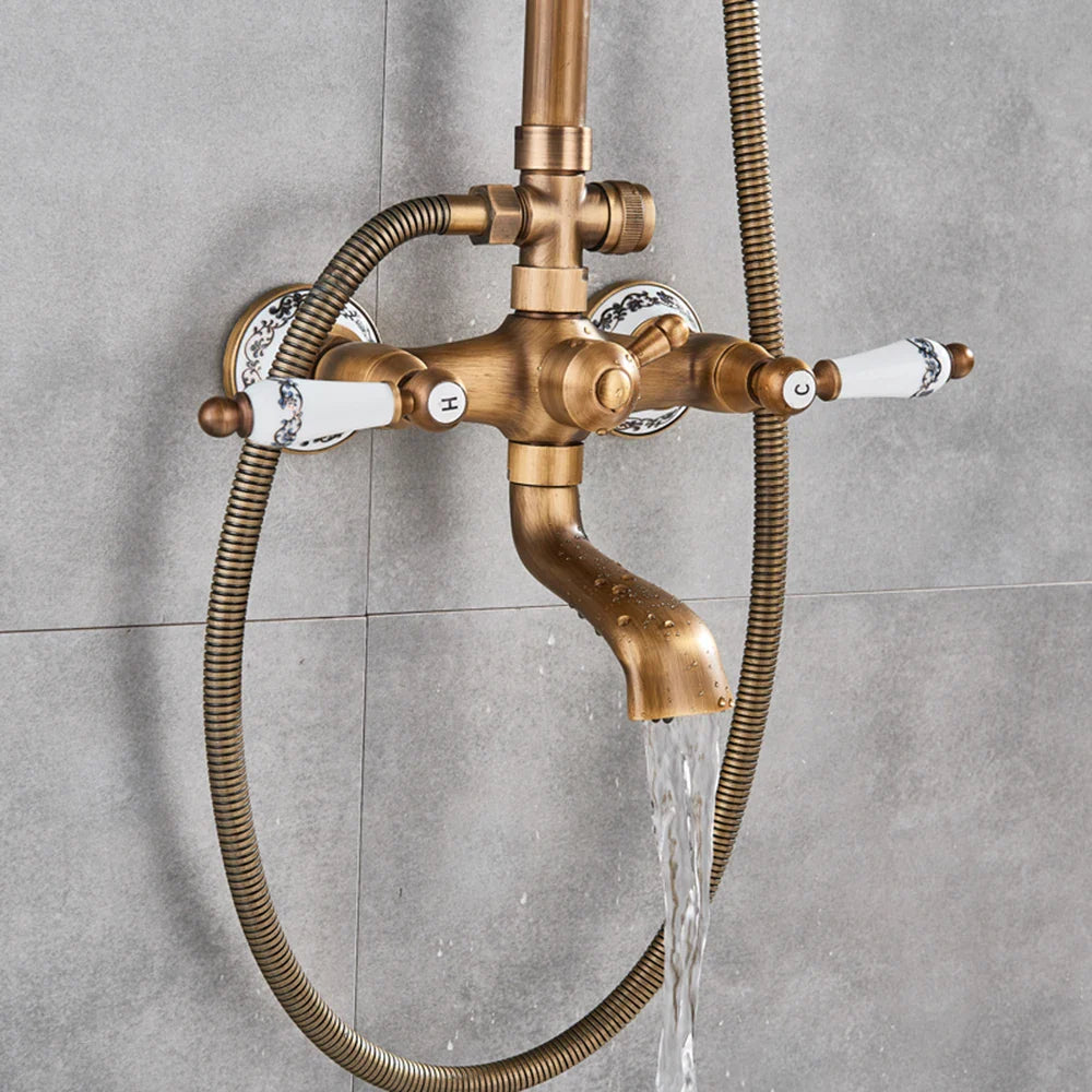 Antique brass bathtub shower faucet with white ceramic handles blue floral patterns and flexible hose POIQIHY shower set