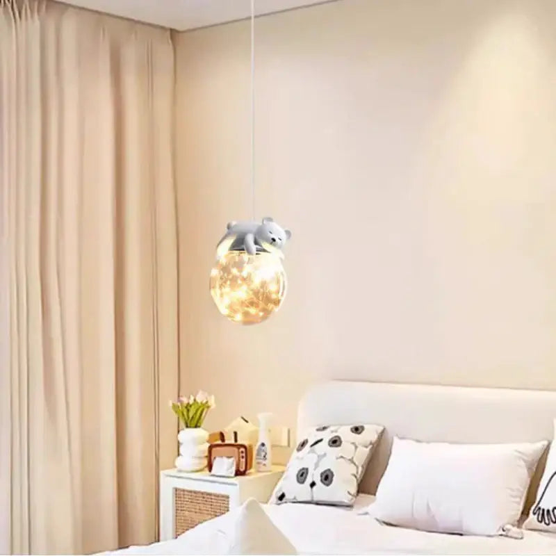 A gray polar bear glass animal led chandelier with warm fairy lights for children’s room or room animal led decor