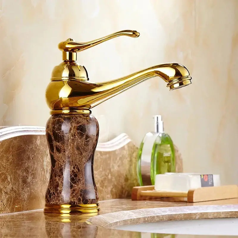 Polished brass bathroom sink faucet with decorbites golden marble base in dark brown for golden marble bathroom decor