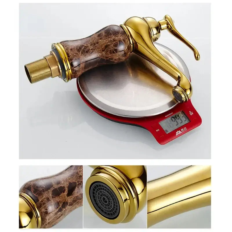 Polished brass bathroom sink faucet with decorbites golden marble finish and sleek brown marble-patterned handle and spout