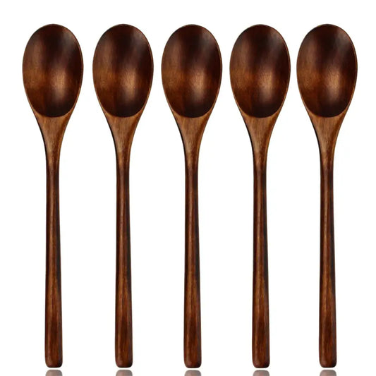 Set of five polished dark brown wooden spoons with natural grain for wooden spoon soup and dining room use