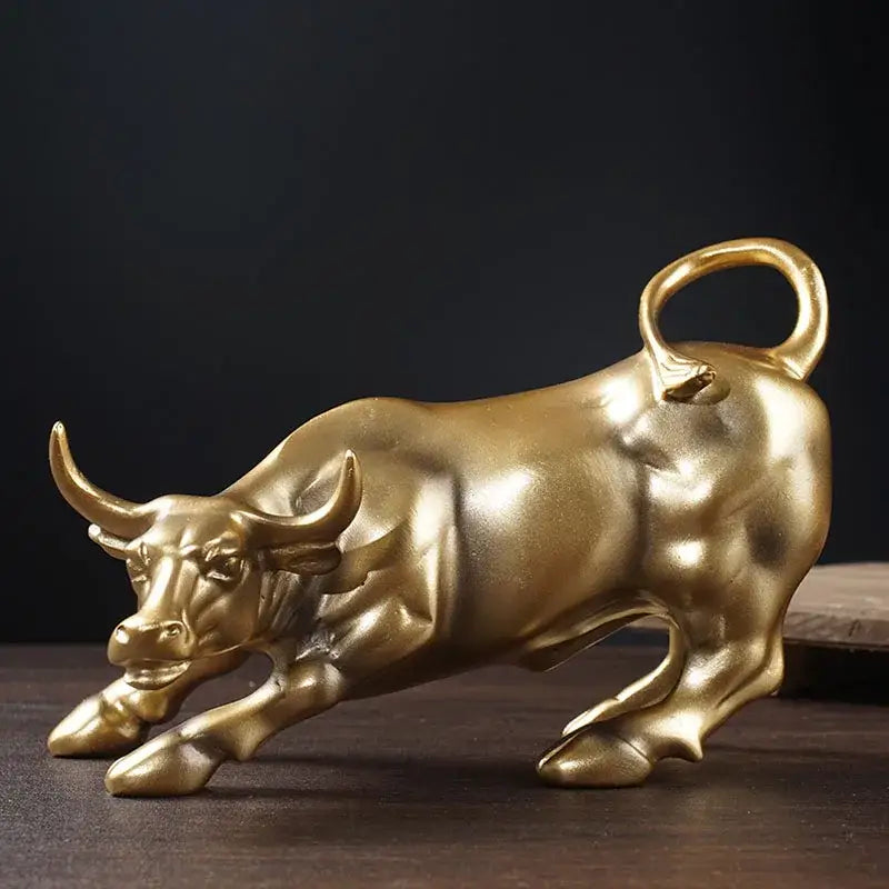 Polished gold wall street bull statue with reflective surface and detailed musculature for decorbites gold wall decor