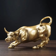 Polished gold wall street bull statue with reflective surface and detailed musculature for decorbites gold wall decor
