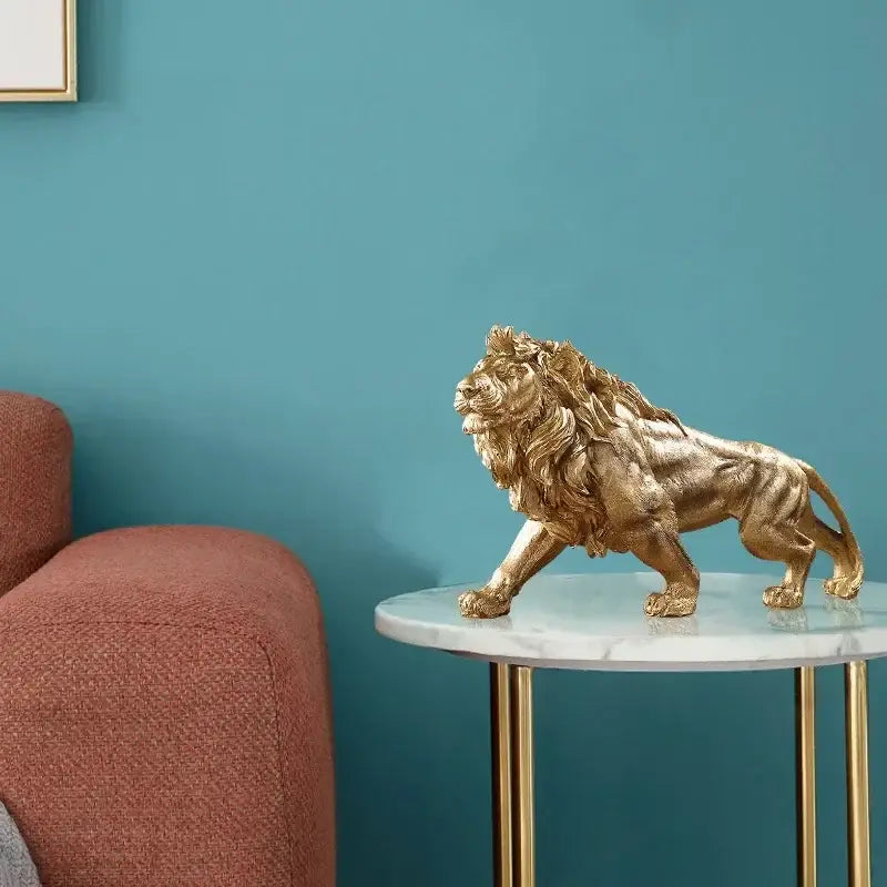 Polished golden lion king resin statue with detailed mane and muscular physique for home office decorbites decor