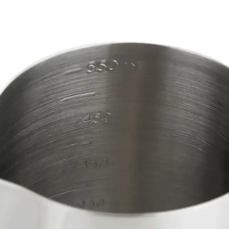 Polished stainless steel frothing cup with brushed finish and engraved volume markings by decorbites frothing cup