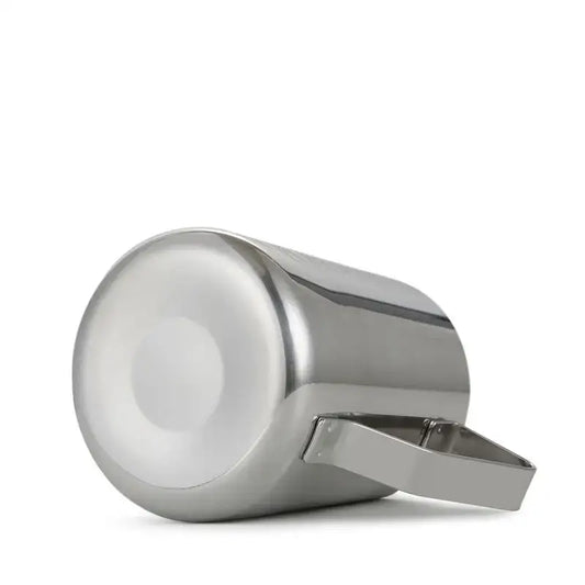 A polished stainless steel frothing cup with integrated handle for latte art by decorbites frothing cup