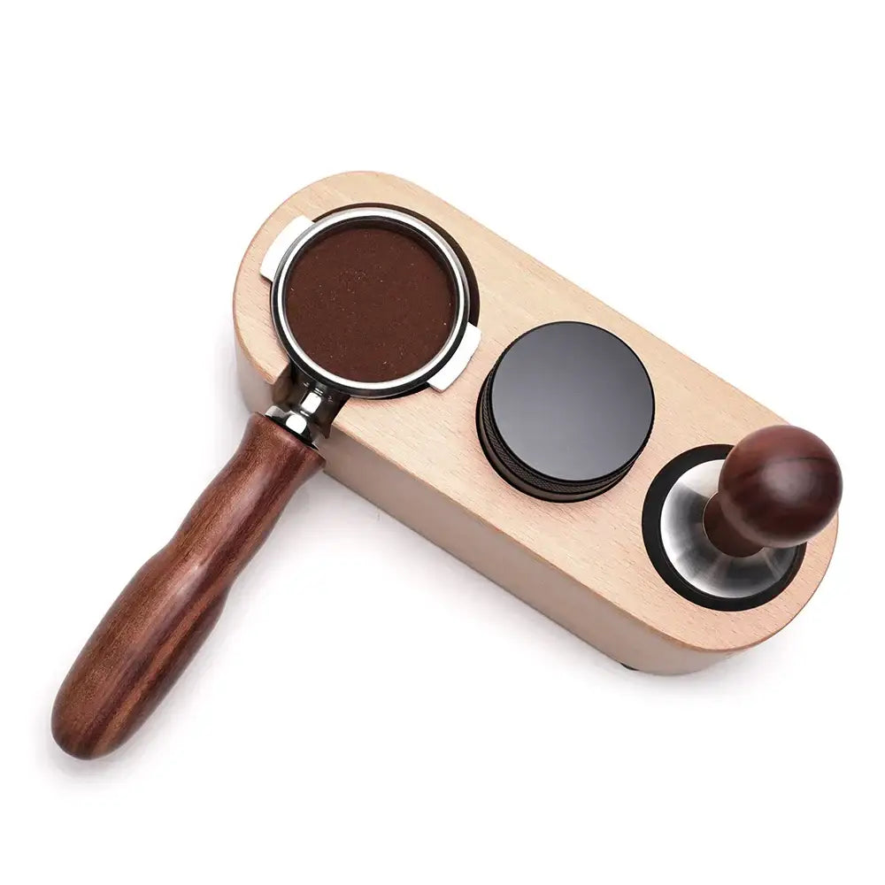 Light wood coffee tamp station with dark brown decorbites coffee bottomless portafilter handle and metal components