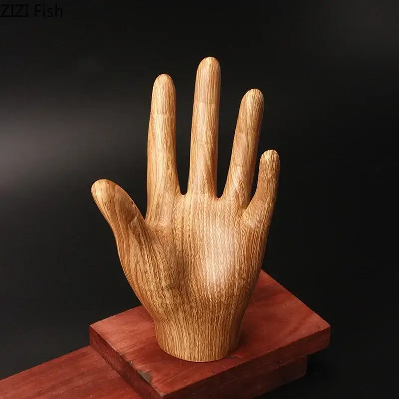 Polished light brown wooden hand palm sculpture with natural grain patterns for living room decor