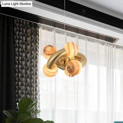 Lámpara de araña esférica de cristal azul/beige posmoderna: Lámpara colgante LED para sala de estar con diseño retorcido de 6 cabezas.