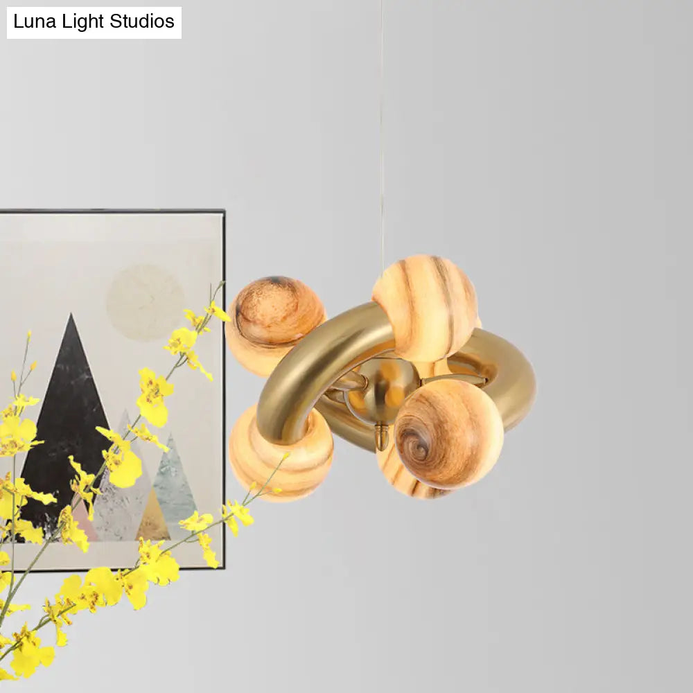 Lámpara de araña esférica de cristal azul/beige posmoderna: Lámpara colgante LED para sala de estar con diseño retorcido de 6 cabezas.