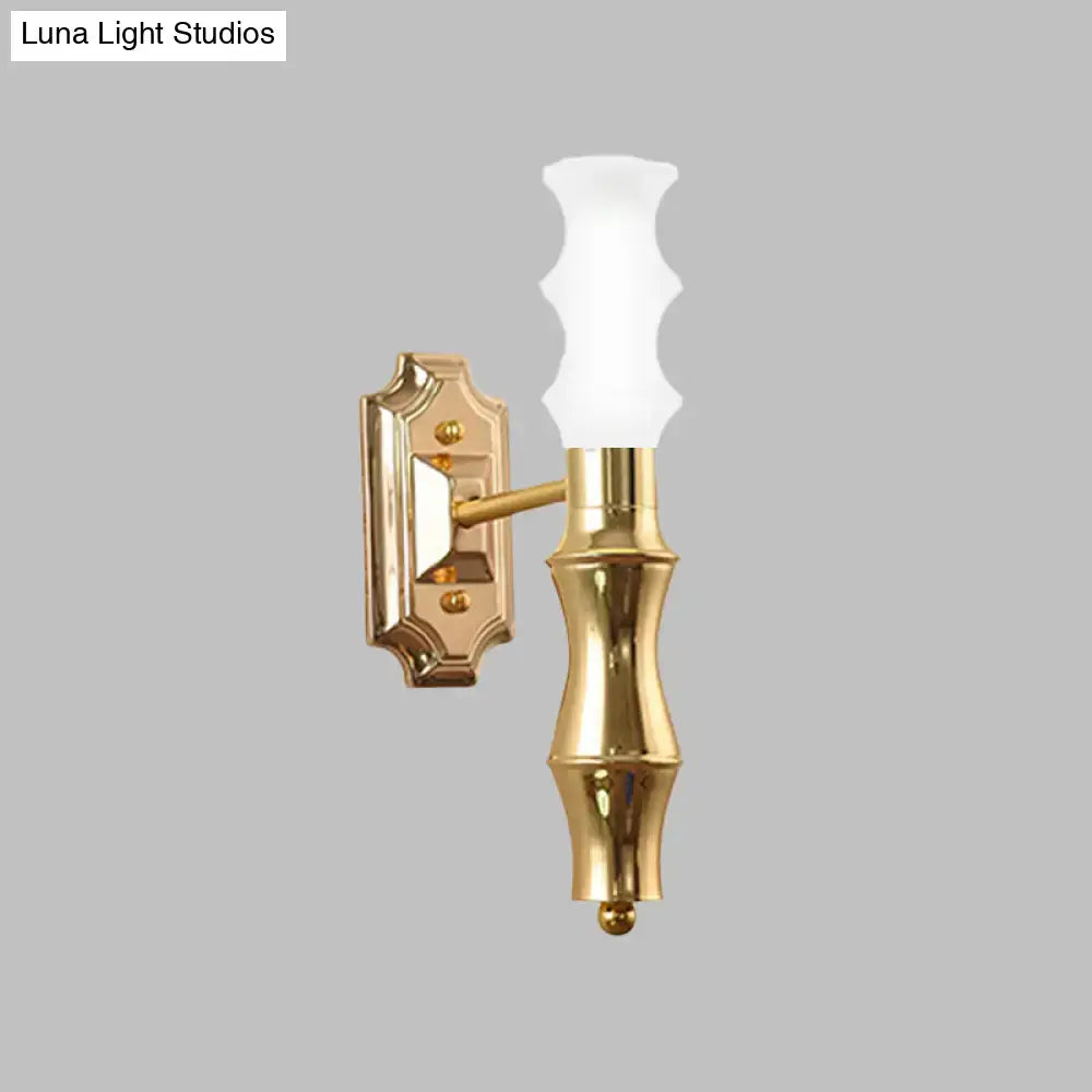 Gold-finished brass bamboo wall sconce with frosted glass shade and e27 bulb base for living room lighting