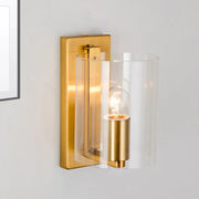 Post modern brass wall sconce with gold tone, clear textured white cylindrical glass shade, and exposed bulb for bedroom lighting 110v-120v 220v-240v