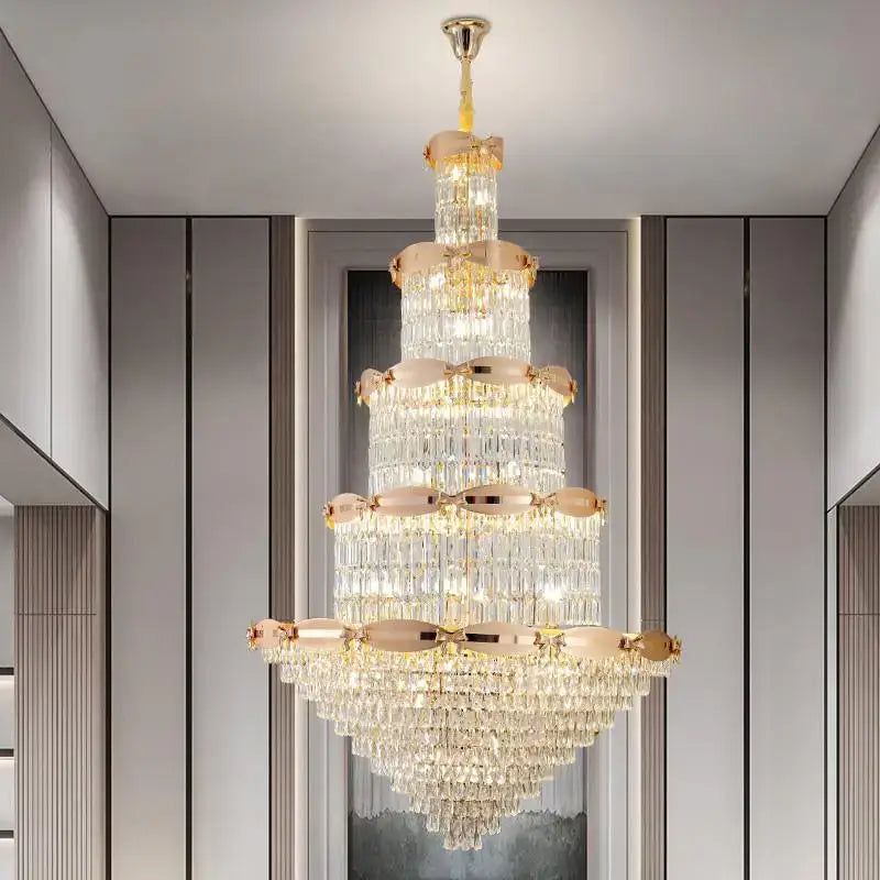 Post-modern gold grand hall crystal chandelier with multi-tiered clear crystals and gold-toned metal decorbites grand hall