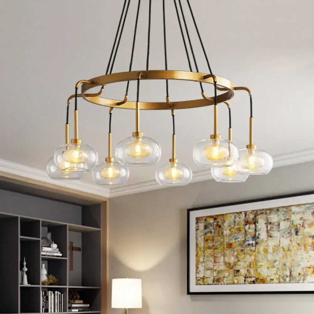 Decorbites post-modern island chandelier with brass finish black cords and clear glass globe shades for LED lighting