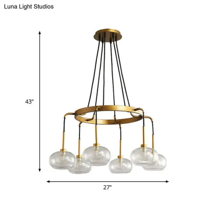 DecorBites™ post-modern island chandelier with gold finish, clear glass globe shades, black cords, and LED light options