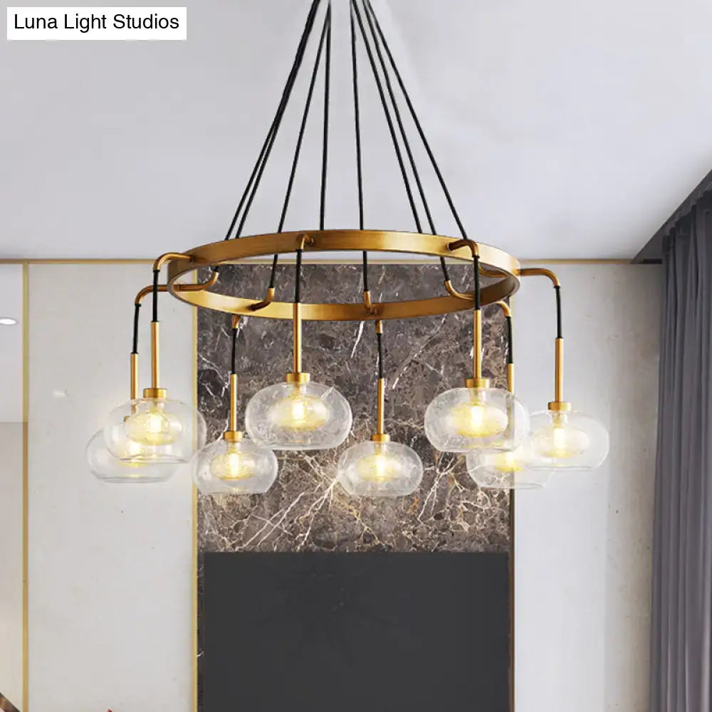 Decorbites post-modern island chandelier with gold finish clear glass globe shades and black cord suspension