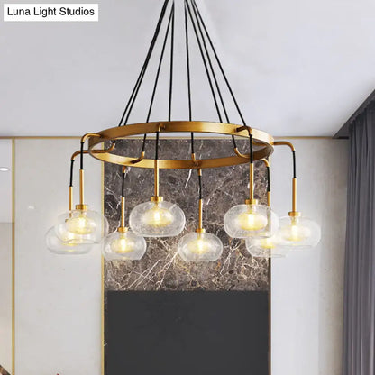 Decorbites post-modern island chandelier with gold finish clear glass globe shades and black cord suspension
