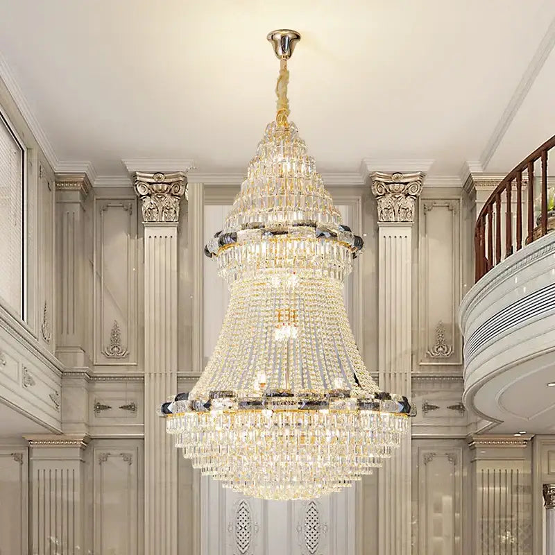 Post-modern luxury crystal chandelier with gold-toned metal and cascading clear and darkened crystals for decorbites light luxury