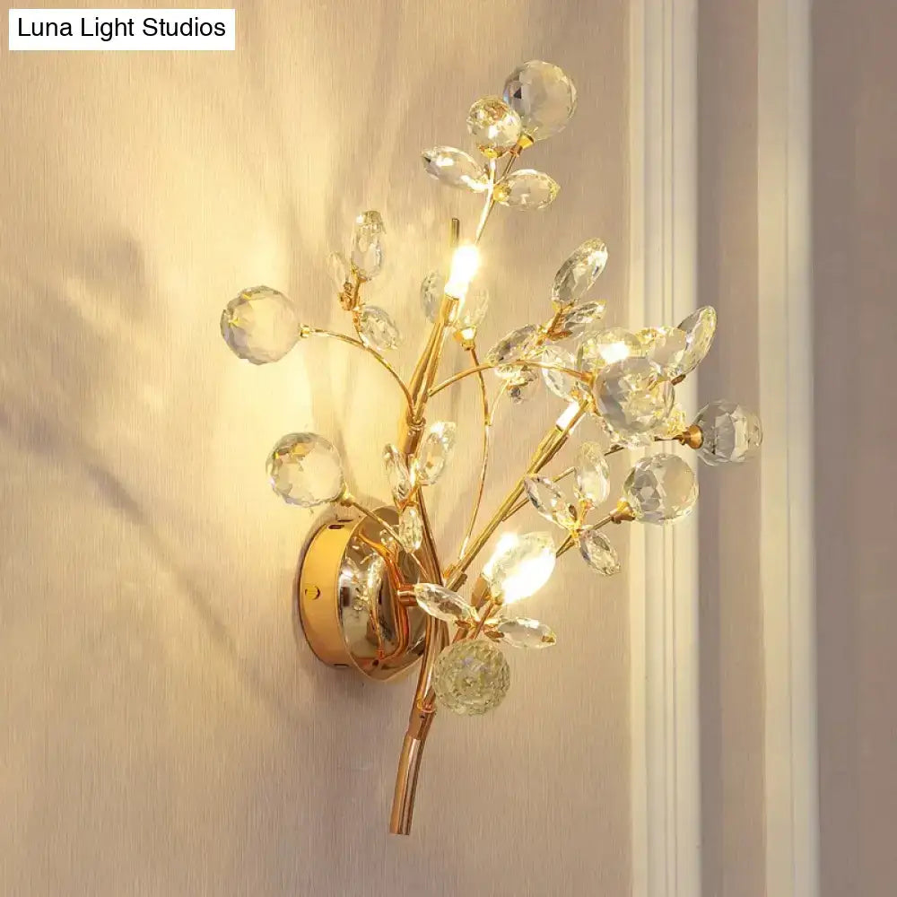 Post modern luxury gold crystal branch wall sconce with clear crystal blossoms and leaves for bedroom lighting
