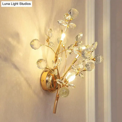 Post modern luxury gold crystal branch wall sconce with clear crystal blossoms and leaves for bedroom lighting