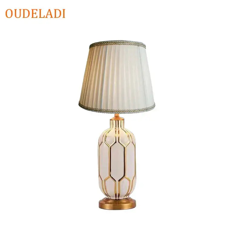 Elegant cream ceramic table lamp with gold geometric accents and pleated shade by ouedeladi for bedroom lighting decorbites blue ceramic