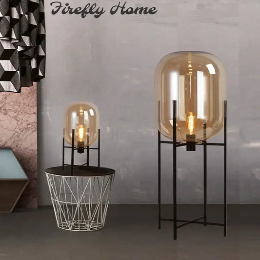 Tall amber glass ball floor lamp with black metal frame for living room decorbites glass ball lighting