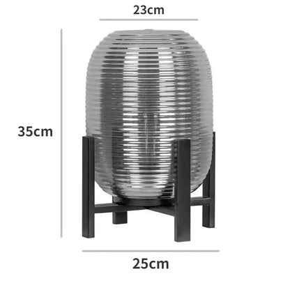 Postmodern amber glass ball floor lamp with ribbed glass ball and black metal frame by decorbites for living room decor
