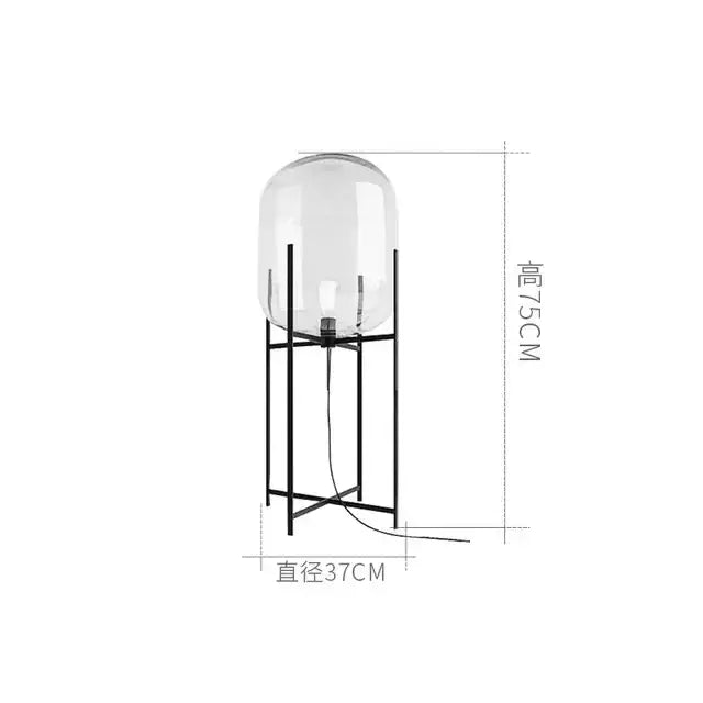 Postmodern floor lamp with black metal frame and clear glass ball shade ideal for living room decorbites glass ball