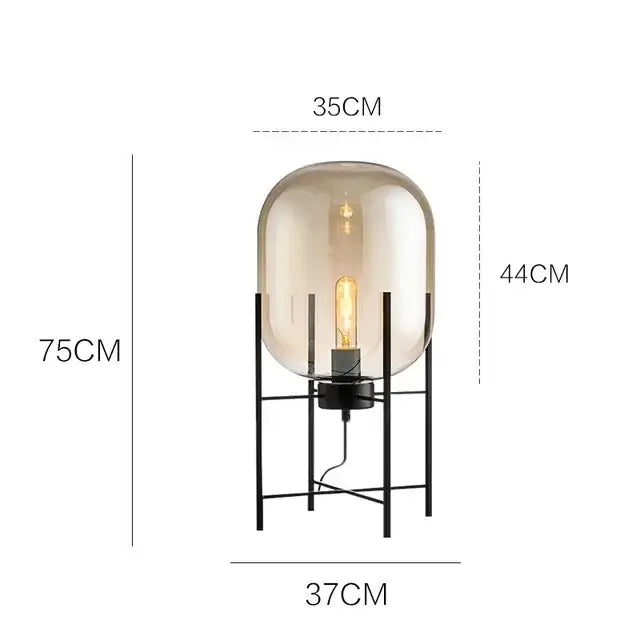 Postmodern amber glass ball floor lamp with a black metal frame featuring a translucent glass ball decorbites glass ball design