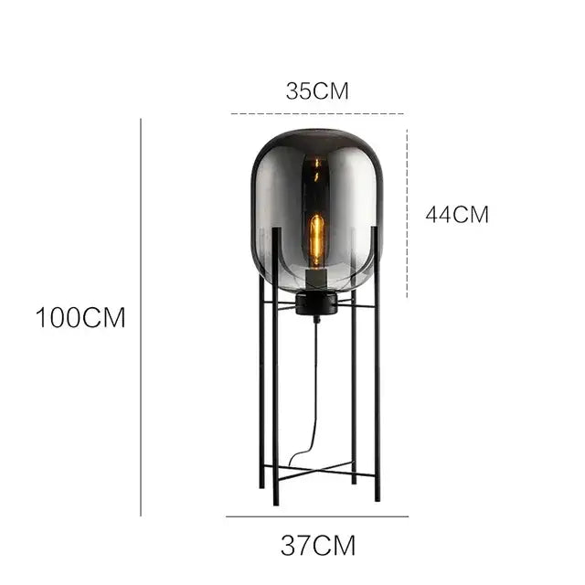 Postmodern amber glass ball floor lamp with black metal frame and smoked glass globe featuring exposed filament bulb