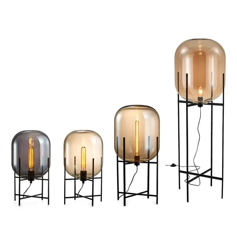 Set of four postmodern floor lamps with amber and gray glass ball globes on black metal stands for living room decorbites glass ball