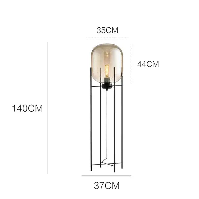 Postmodern amber glass ball floor lamp with black metal frame and exposed filament bulb for living room decorbites glass ball