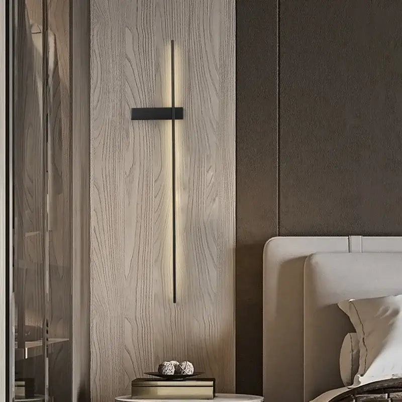 Modern black copper wall lamp with sleek vertical light beam for minimalist bedroom lighting decorbites copper wall lamp