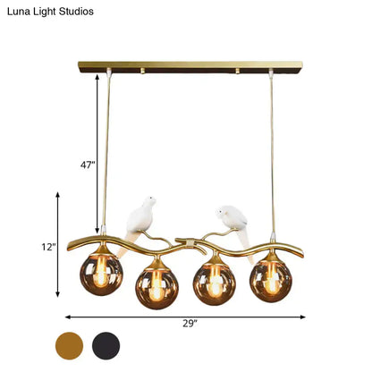 Decorbites postmodern black gold iron pendant light with amber ball glass shades and white ceramic bird accents