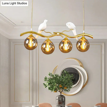 Decorbites postmodern black gold iron pendant light with amber ball glass shades and white ceramic bird decor