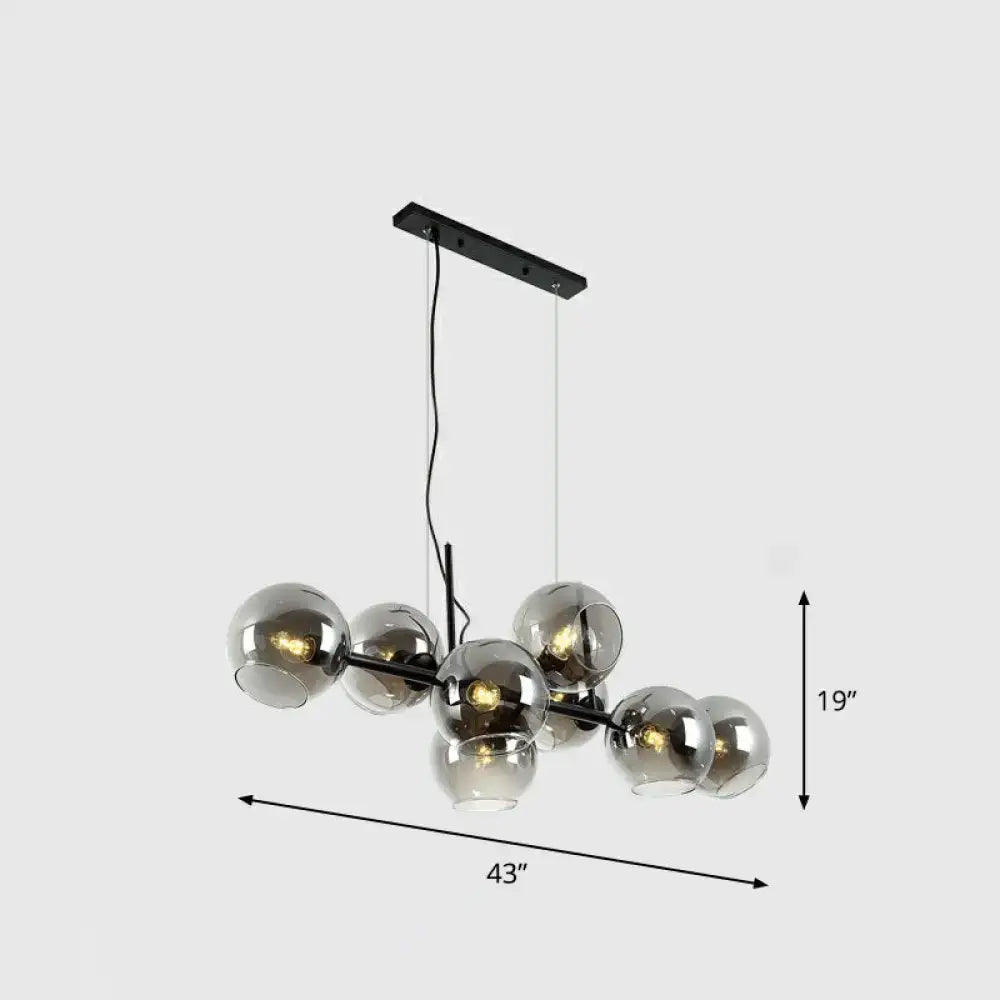 Postmodern black metal chandelier with eight clear smoke grey glass globe shades for dining room lighting type