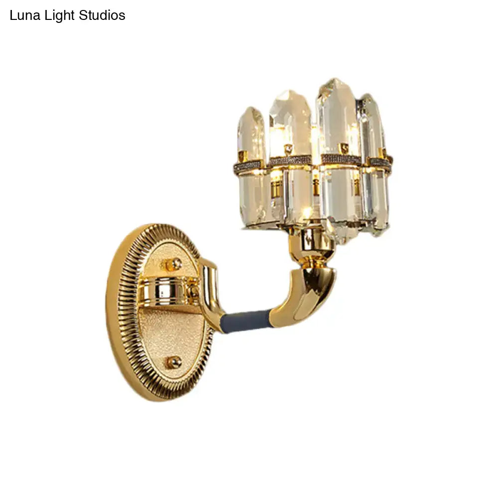 Gold-finished postmodern wall mount lamp with curved arm and blue gold crystal prisms for bedroom sconce lighting