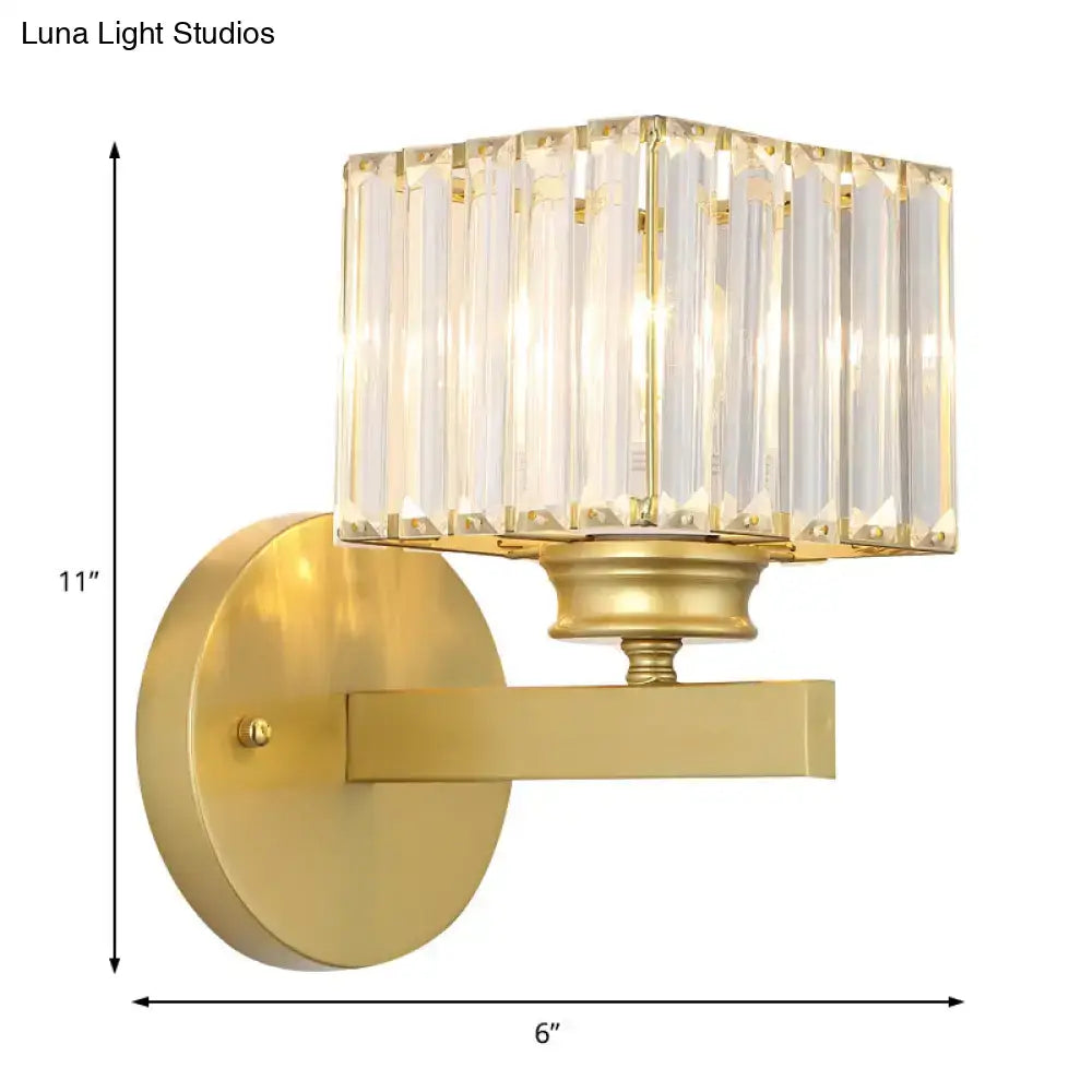 Postmodern brass black wall sconce with gold finish and rectangular crystal block shade for bedroom lighting