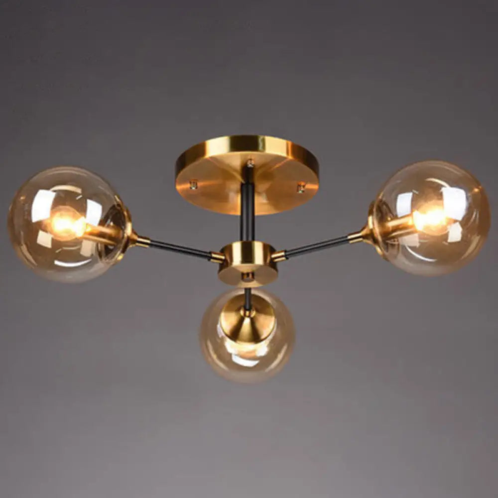 DecorBites™ DecorBites™ Postmodern Brass Finish Radial Ceiling Lamp with Glass Ball Shade