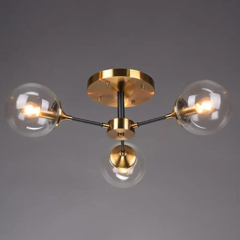 DecorBites™ DecorBites™ Postmodern Brass Finish Radial Ceiling Lamp with Glass Ball Shade