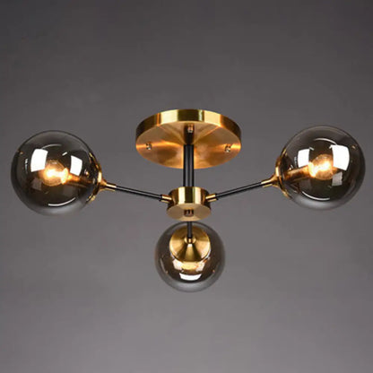 DecorBites™ DecorBites™ Postmodern Brass Finish Radial Ceiling Lamp with Glass Ball Shade