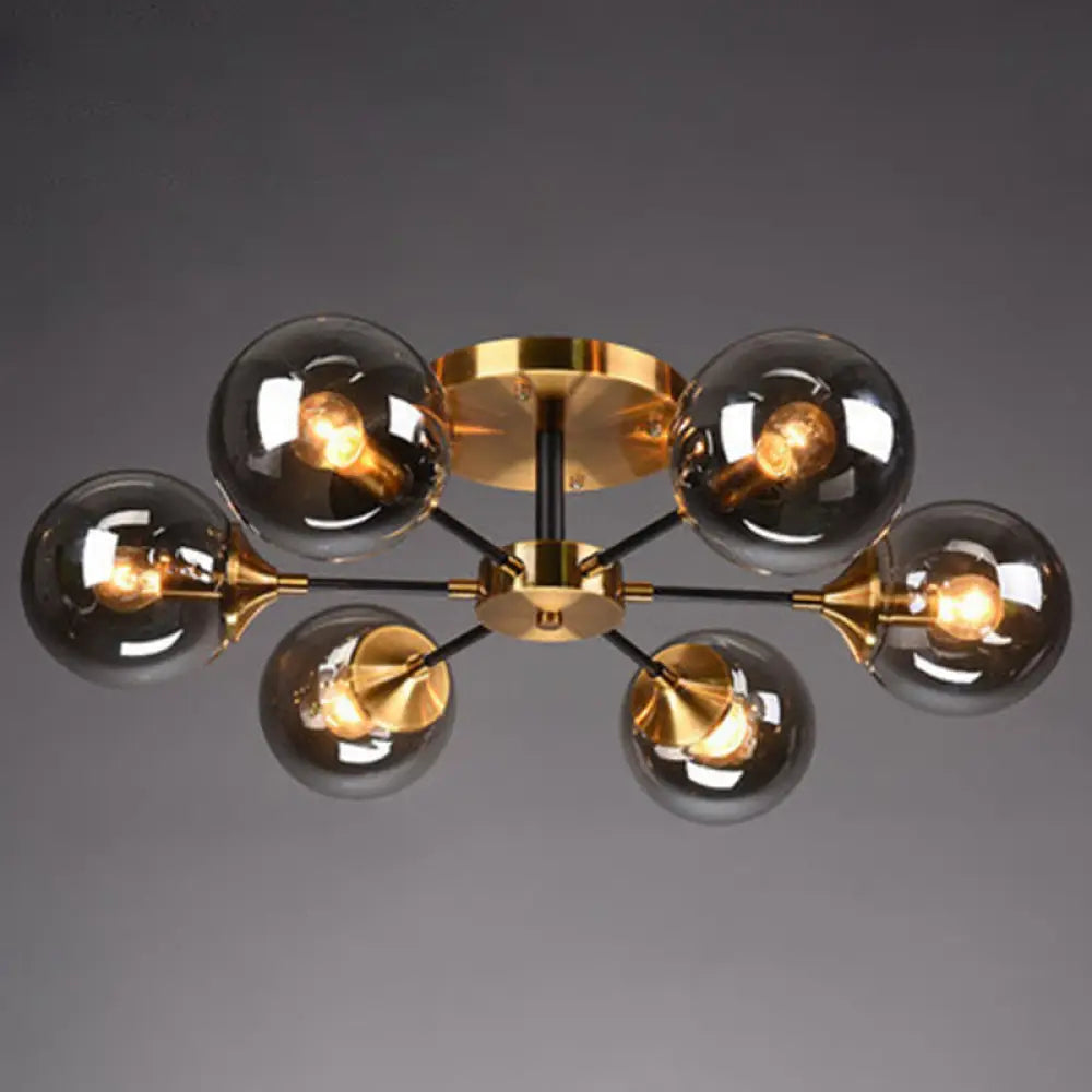 DecorBites™ DecorBites™ Postmodern Brass Finish Radial Ceiling Lamp with Glass Ball Shade