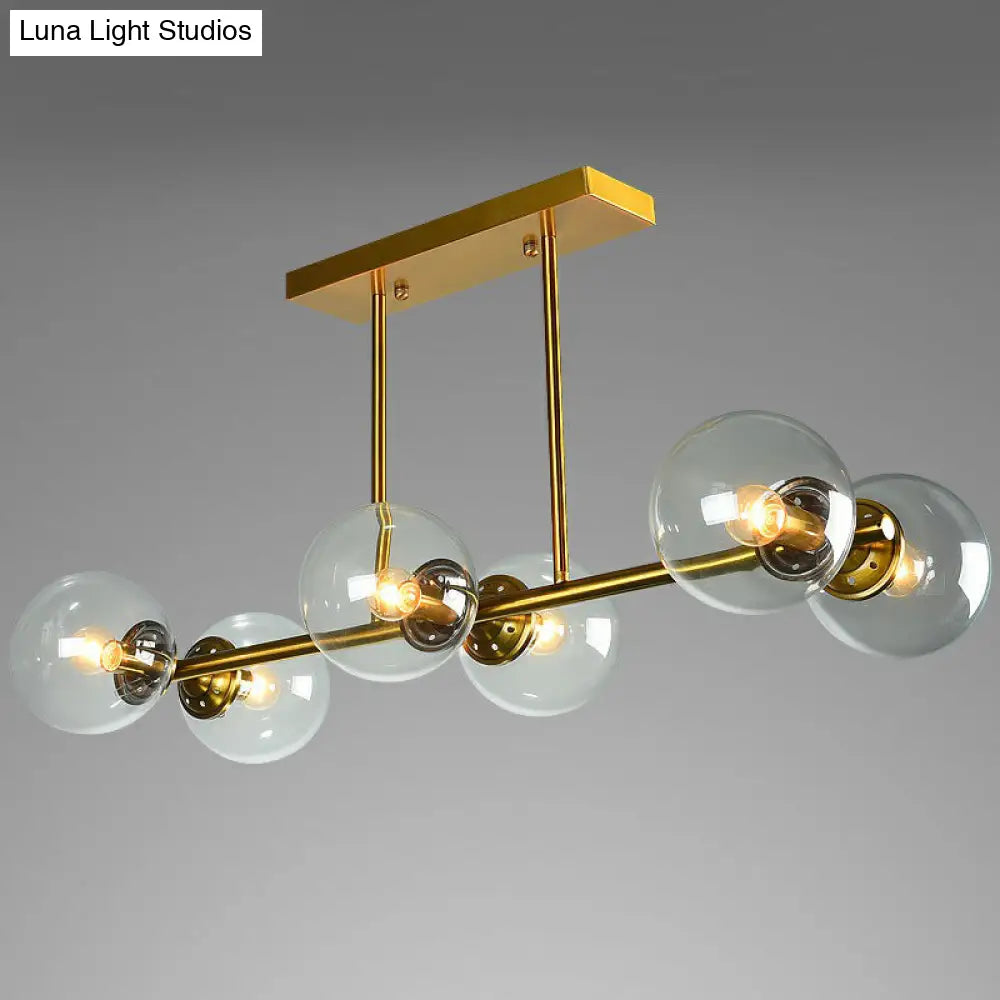 DecorBites™ Postmodern Brass Island Light with Globe Glass Shade: Stylish Metal Ceiling Fixture