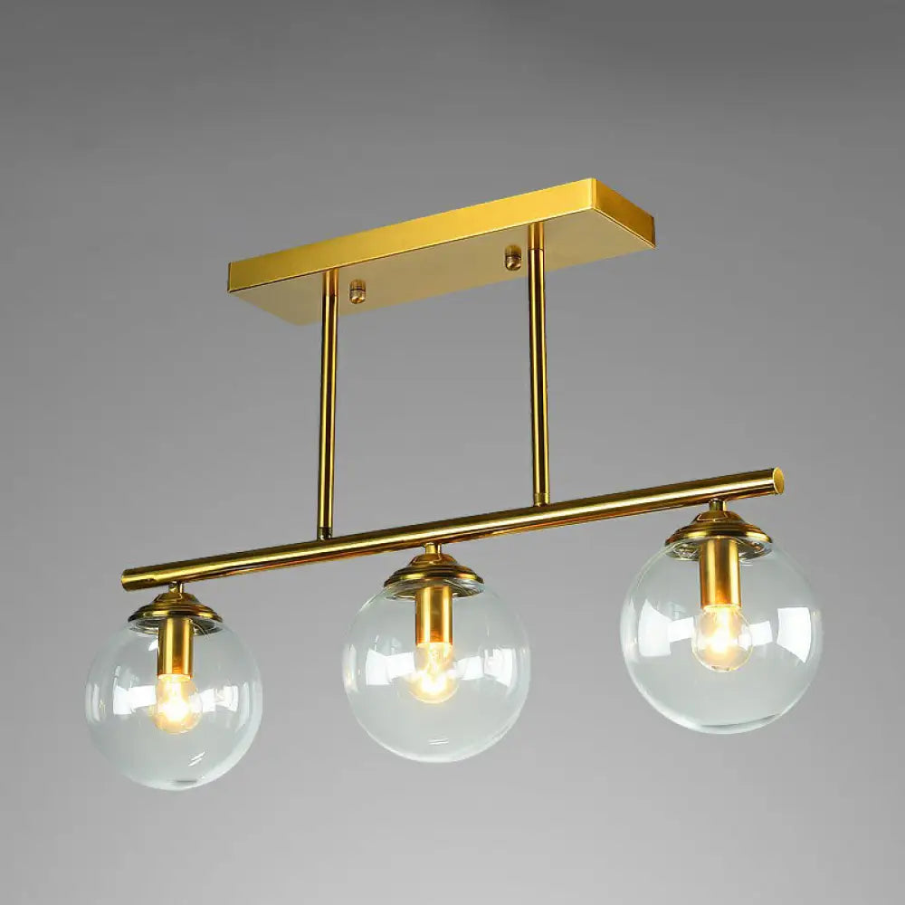 DecorBites™ Postmodern Brass Island Light with Globe Glass Shade: Stylish Metal Ceiling Fixture