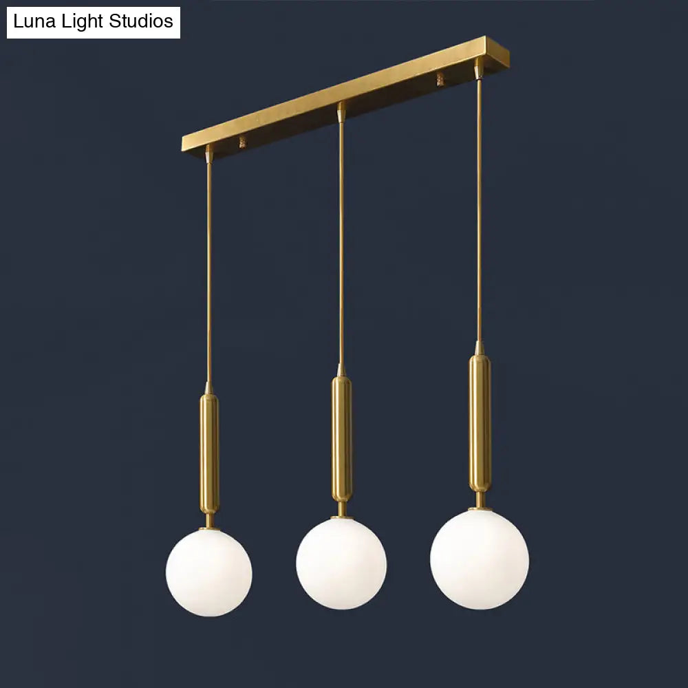 Postmodern Brass Pendant Ceiling Light with Ball Glass Shade - Ideal for Dining Rooms - 3 Lights